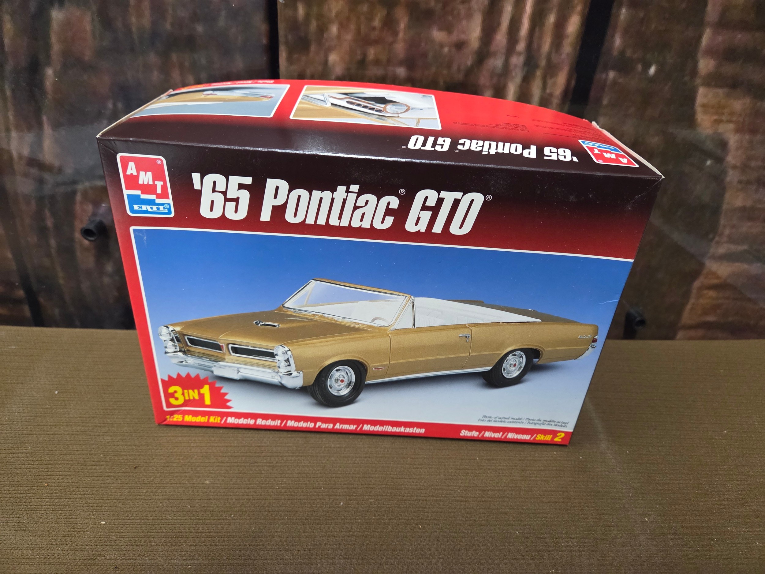 An ERTL AMT '65 Pontiac GTO 3 in 1 model kit. 1:25 scale