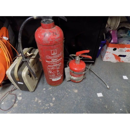 74 - 2 Full Fire Extinguishers