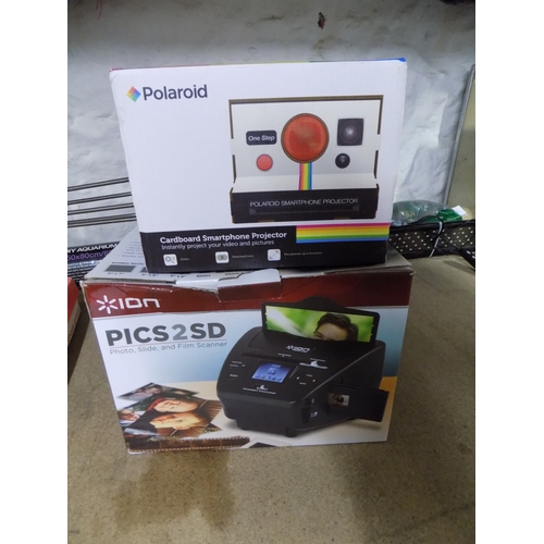 139 - Boxed Cardboard Smartphone projector and Boxed Ion Pics 2 SD
