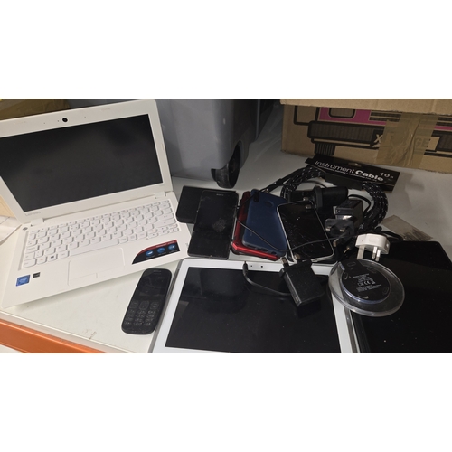 107 - A collection of electronics including Lenovo laptop and smartphones