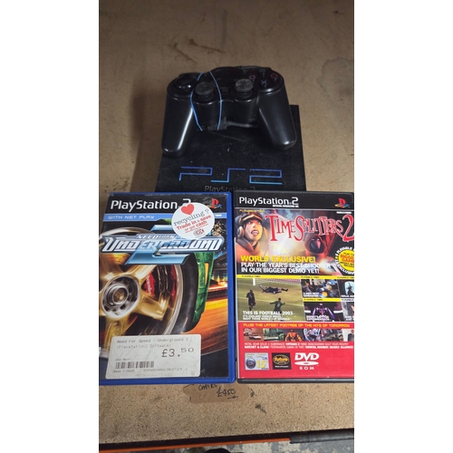 277 - PlayStation 2 Console with Controller and Two Games