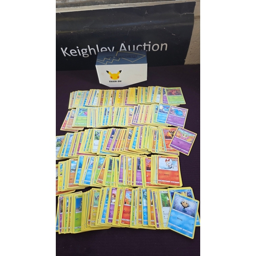 104 - A Collection of Pokémon TCG Sword & Shield Series Bulk Cards with 25th Anniversary Celebrations Stor... 