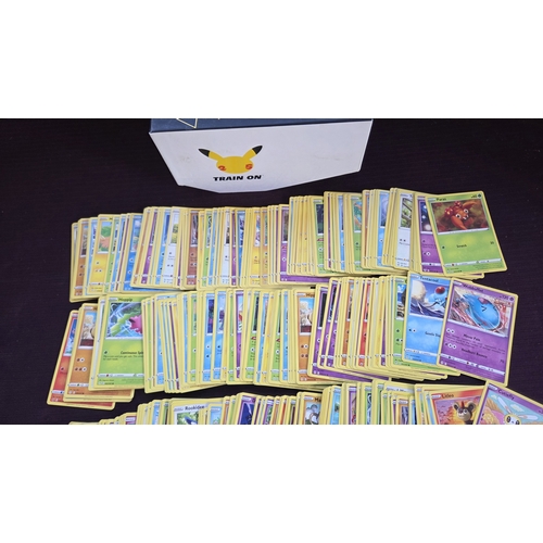 104 - A Collection of Pokémon TCG Sword & Shield Series Bulk Cards with 25th Anniversary Celebrations Stor... 