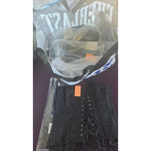 268 - An Assortment of FeelinGirl Performance Costume Corsets and Faux Leather Flogger