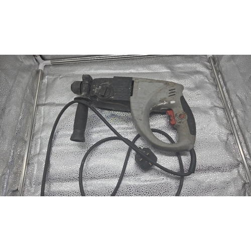 278 - An Electric SDS Plus Rotary Hammer Drill powers on