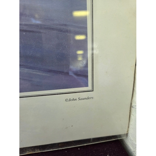 389 - A Trio of Sports Memorabilia comprising John Saunders Motorsport Prints and a 2002 FIFA World Cup Fr... 