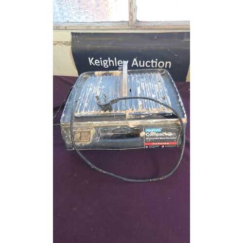 87 - A Plasplugs Compact Plus diamond wet wheel tile cutter, model DWW100