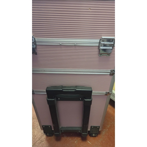 206 - A Professional Modular Rolling Aluminium Makeup Train Case in Pink