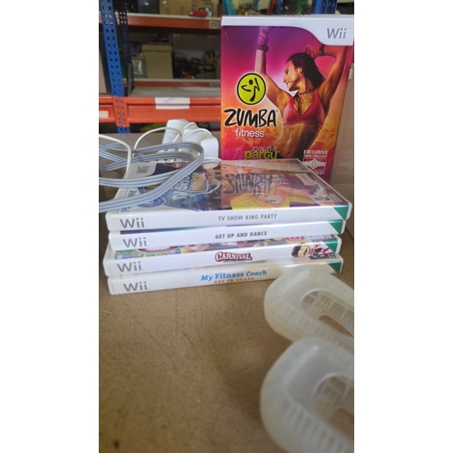 251 - A Collection of Nintendo Wii Gaming Equipment and Accessories Including Console and Games working or... 