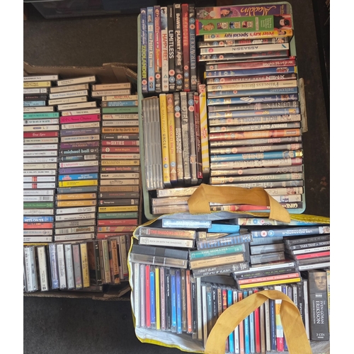 288 - An Assortment of Approximately 200 Mixed Media Items Comprising DVDs, Audio Cassettes, and Music CDs