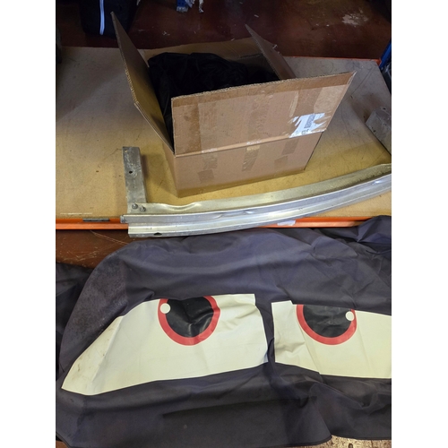 300 - A Bumper Reinforcement Bar and a Fuel Lagoon Style Automotive Front Mask and a set of Car Seat Cover... 