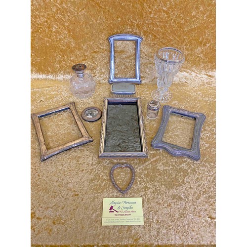 51 - Mixed lot of silver comprising silver photo frames, Tortoiseshell topped scent bottle, Silver topped... 