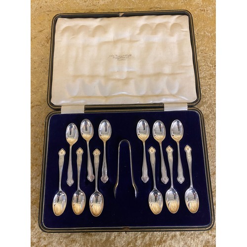 44 - Boxed set of twelve silver spoons and sugar tongs Monogrammed with letter WMaker Cooper Brothers and... 