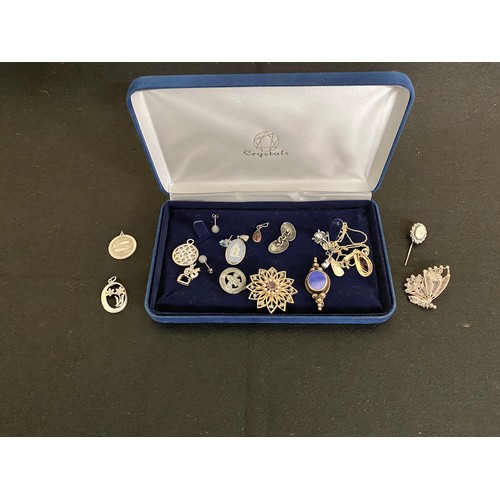 7 - Blue box of assorted jewellery including a Wedgwood jasper pendant, Silver pendants, stick pin etc