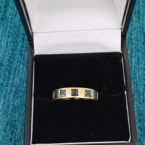 2 - 18ct Yellow Gold Sapphire Band
- hand made/bespoke
- Princess cut Cerion Sapphires
- 4g