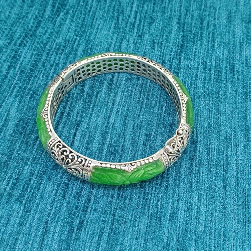 16 - Silver and Jade Bangle
- Flower Design
- Silver 1.6g