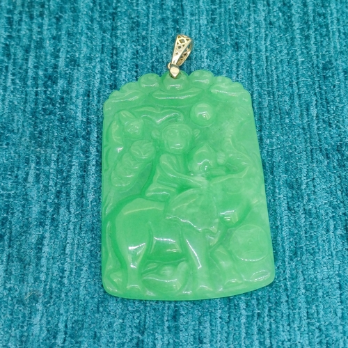 21 - Oriental Carved Jade Pendant
- Consisting of 9ct Gold Bail