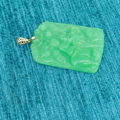 21 - Oriental Carved Jade Pendant
- Consisting of 9ct Gold Bail