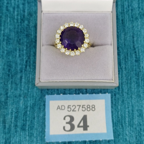 34 - Amethyst & Diamond Cluster Ring
- 18ct Gold
- 9.3g