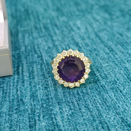 34 - Amethyst & Diamond Cluster Ring
- 18ct Gold
- 9.3g