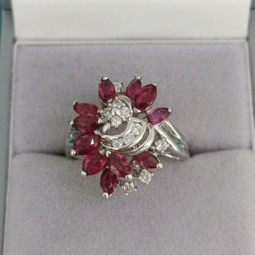 35 - Ruby & Diamond Cluster Ring
- 14ct
- 6.3g