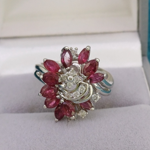 35 - Ruby & Diamond Cluster Ring
- 14ct
- 6.3g