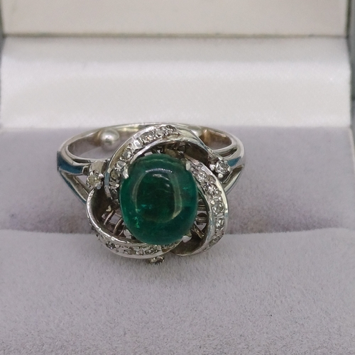 44 - Cabochon Emerald & Diamond Cluster Ring
- 14ct
- 4.9g