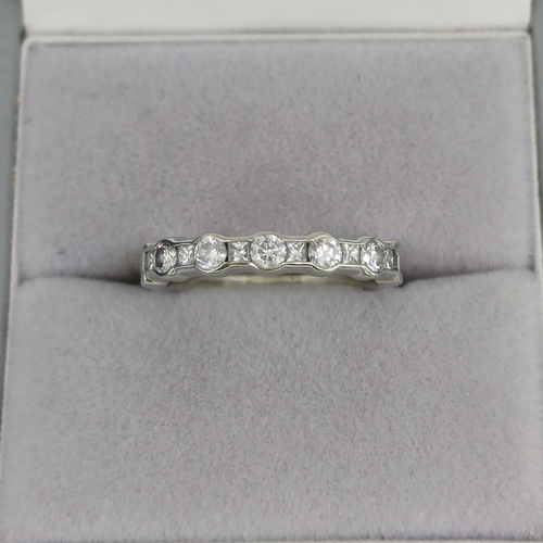 46 - Half Eternity Ring
- Platinum
- Princess & Round Cut Diamonds
- 3.9g