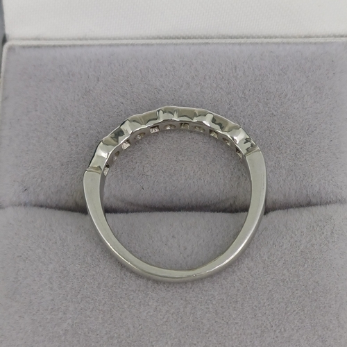 46 - Half Eternity Ring
- Platinum
- Princess & Round Cut Diamonds
- 3.9g