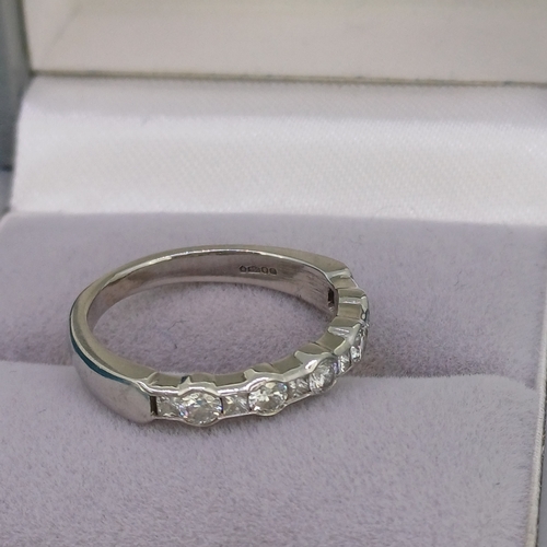 46 - Half Eternity Ring
- Platinum
- Princess & Round Cut Diamonds
- 3.9g