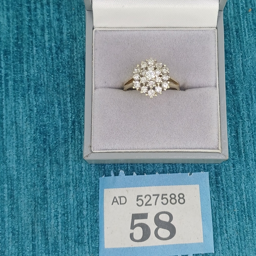 58 - Ladies Diamond Cluster Ring
- 9ct
- 2.9g