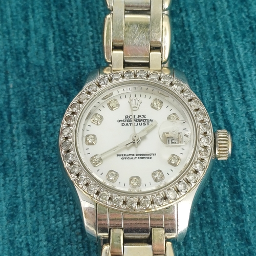 71 - Ladies Rolex
- Diamond Bezel 
- 18ct White Gold
- Date Just