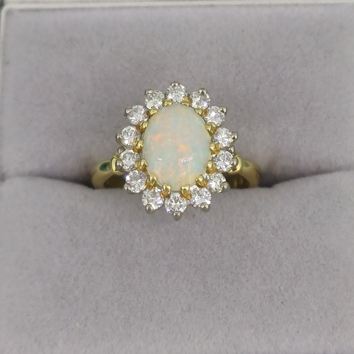 74 - Ladies Opal and Diamond Ring
- 18ct Gold
- approx 65 points
- 4.9g