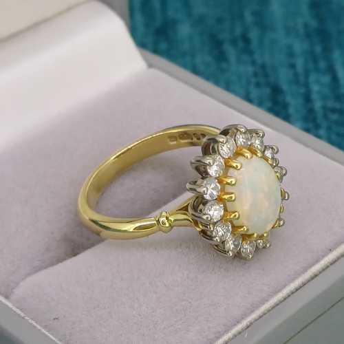 74 - Ladies Opal and Diamond Ring
- 18ct Gold
- approx 65 points
- 4.9g