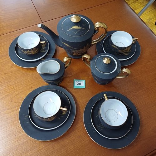 20 - Japanese Geisha Girl Tea Set.  Very fine china in a matte finish.