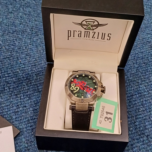 31 - Pramzius Watch in Presentation Box and boxed. 1989 this contains part of the Berlin Wall and is a li... 