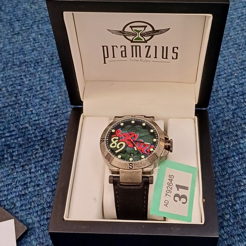 31 - Pramzius Watch in Presentation Box and boxed. 1989 this contains part of the Berlin Wall and is a li... 