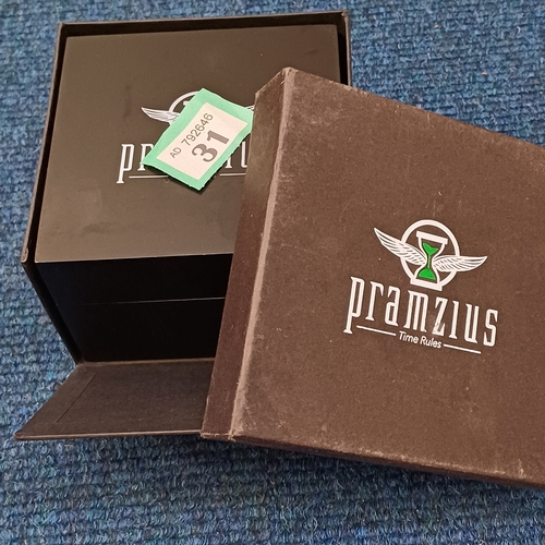 31 - Pramzius Watch in Presentation Box and boxed. 1989 this contains part of the Berlin Wall and is a li... 