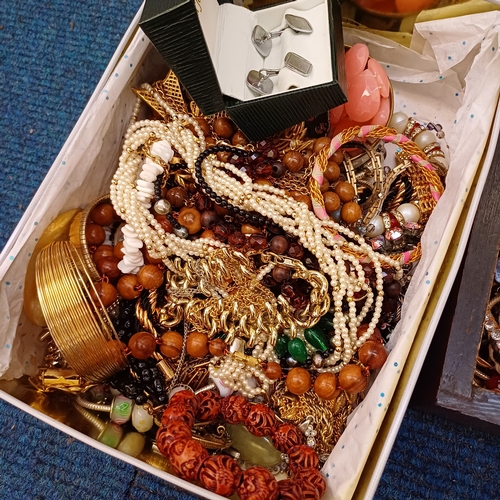 34 - Two boxes of assorted costume jewellery