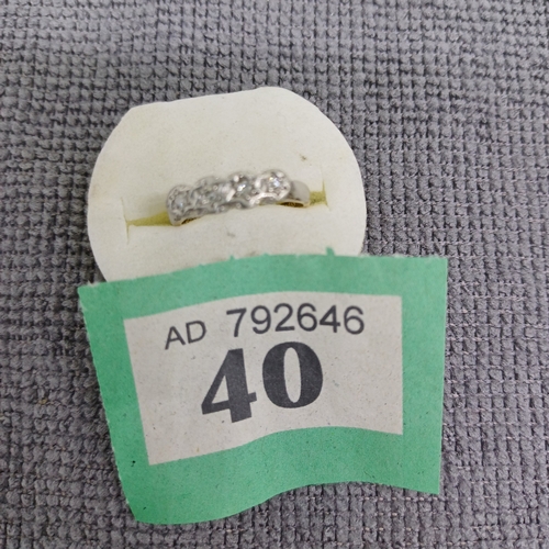 40 - Diamond Ring 1960's
- 18ct
- 2.4g
Size: J