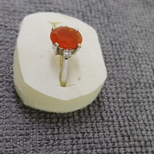 56 - Fabulous Fire Opal and Diamond /ring.  Stunning Colour.
- 18ct
Size: K
- 4.55g