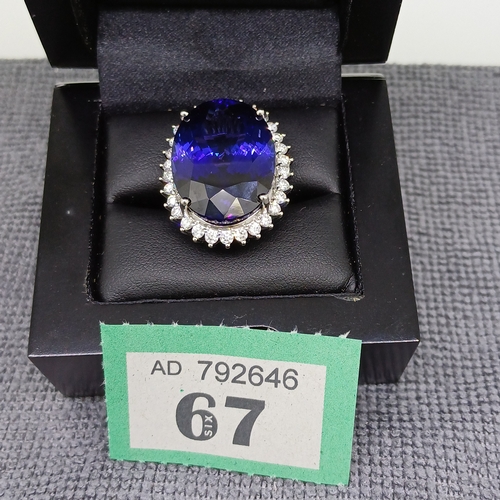 67 - A Stunning Ring.  36 ct Tanzanite Stone set in a ring of Diamonds.  The colour is so pure.
Size: O