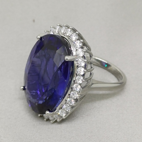 67 - A Stunning Ring.  36 ct Tanzanite Stone set in a ring of Diamonds.  The colour is so pure.
Size: O