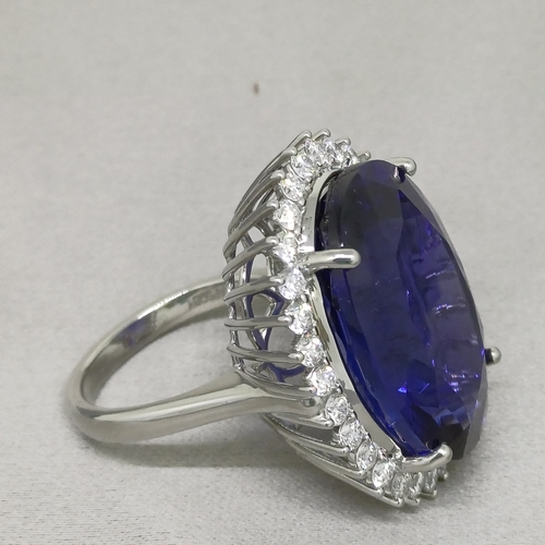 67 - A Stunning Ring.  36 ct Tanzanite Stone set in a ring of Diamonds.  The colour is so pure.
Size: O