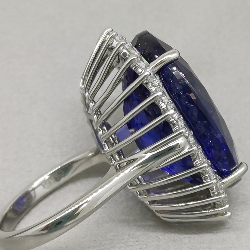 67 - A Stunning Ring.  36 ct Tanzanite Stone set in a ring of Diamonds.  The colour is so pure.
Size: O