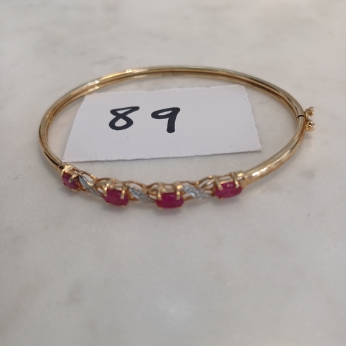 89 - Ruby and Diamond 9ct Gold Bangle