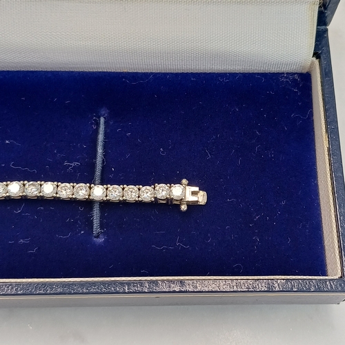 95 - White Gold White Stone Line Bracelet
Approx 9g