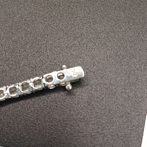 95 - White Gold White Stone Line Bracelet
Approx 9g