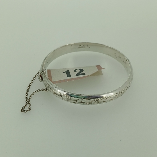 12 - The detail on this Silver Hinged Bangle is very eye catching.
- circa 1960's
- weight 14 g