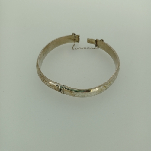 14 - Here with have another beautiful Silver Hinged Bangle.  Funny, it is a bit like Buses nothing coming... 